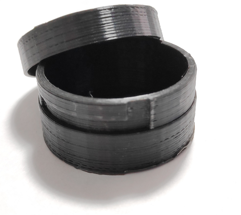 Round box with rotating cap