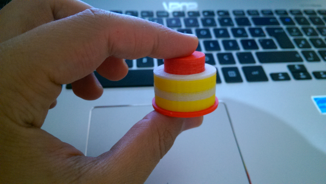 Push-down button with a ballpoint pen spring