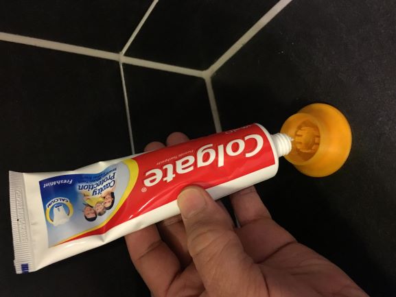 Tooth paste holder