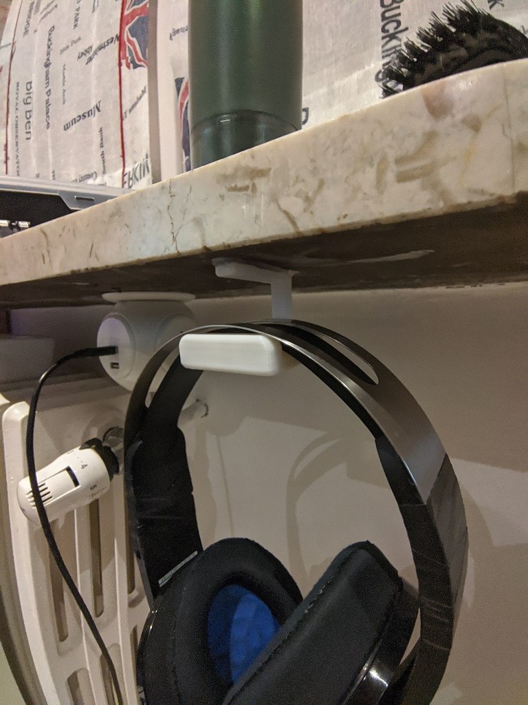 Headset holder under table