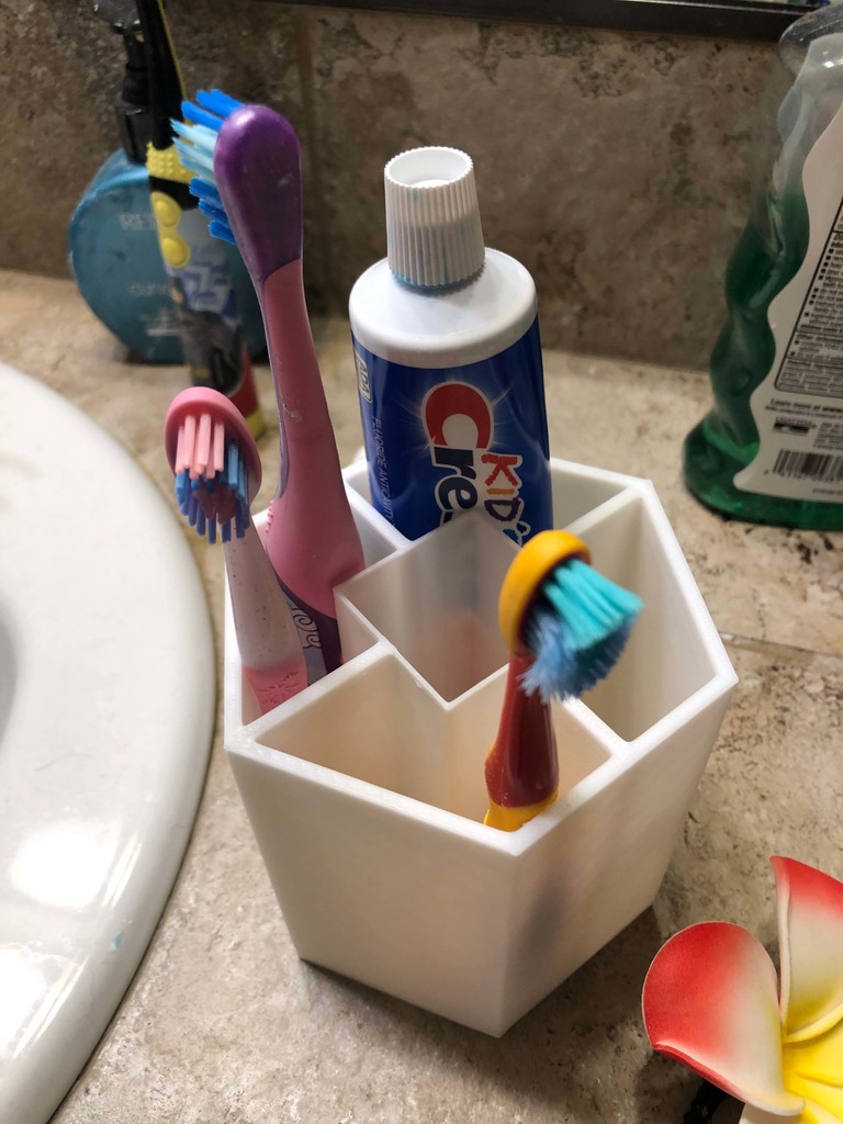 Tooth Brush holder with a lot spots to put things