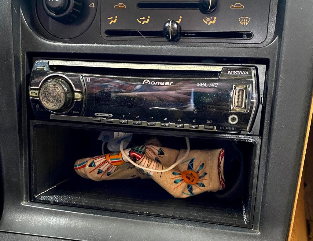 NA Mazda Miata under radio cubby (pre 96)
