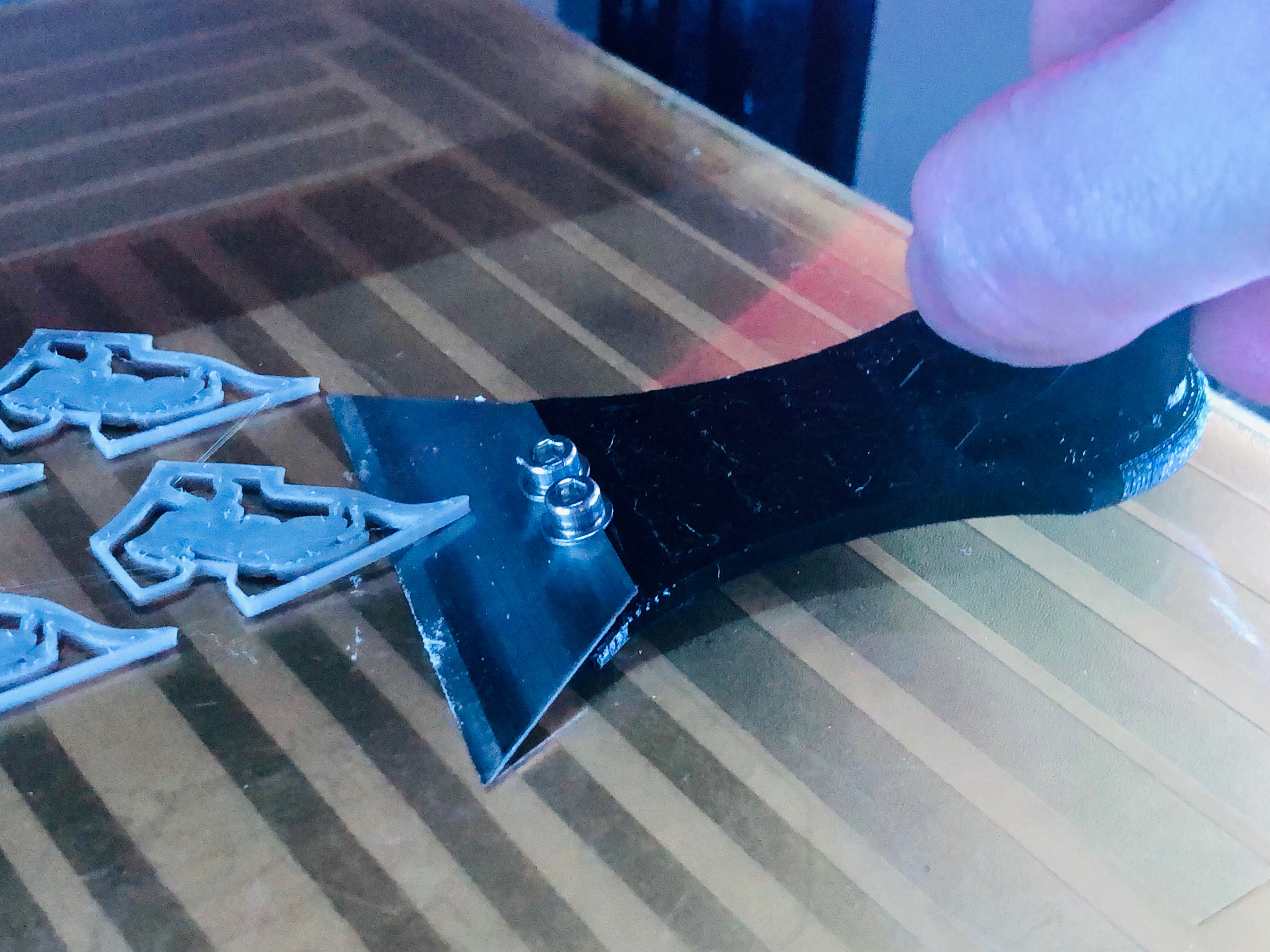 Scraper with grip
