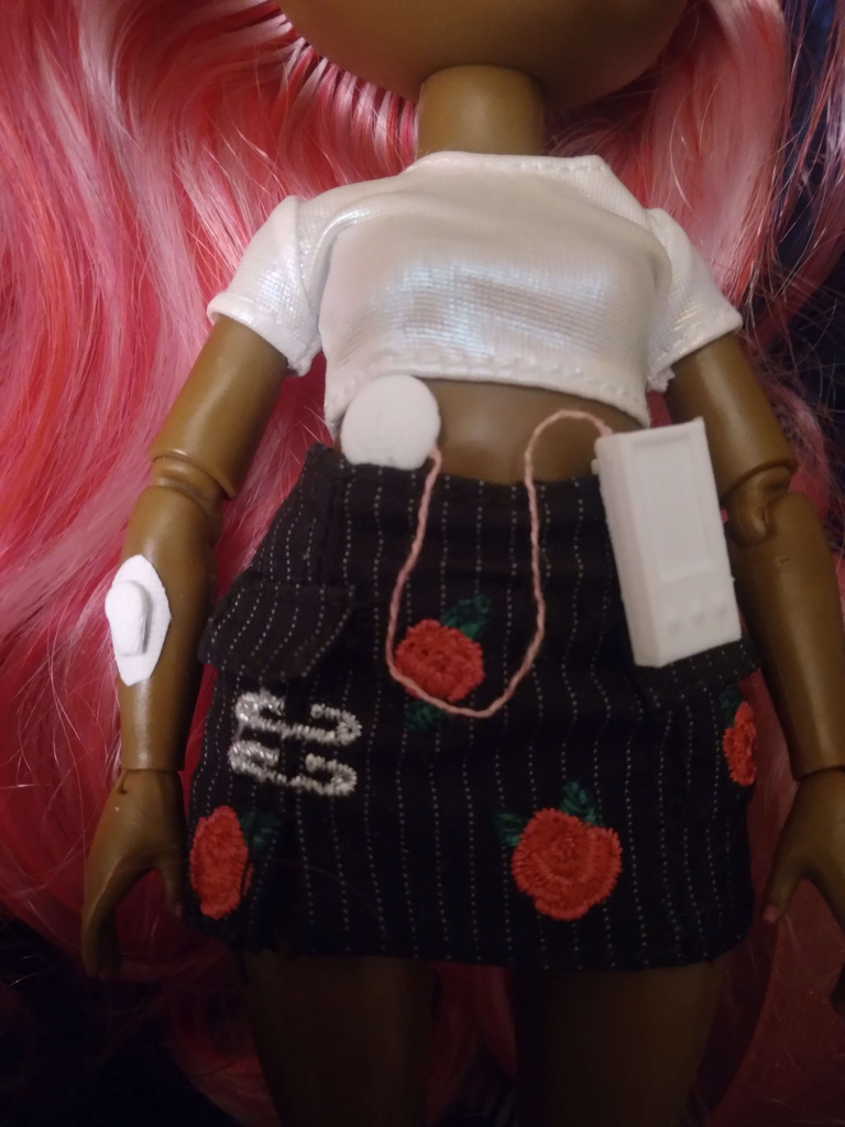 Continuous glucose monitor and insulin pump for dolls