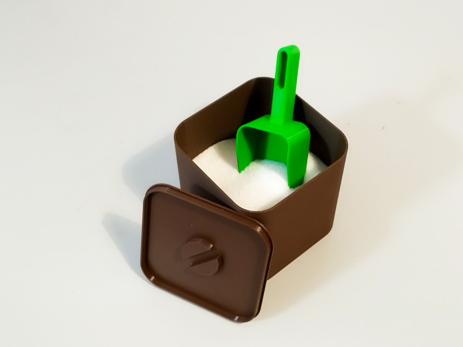 Multipurpose container with dustpan