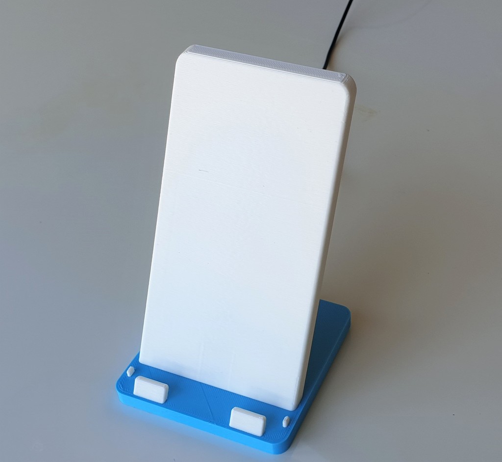 Phone stand with bultin wireless charging 