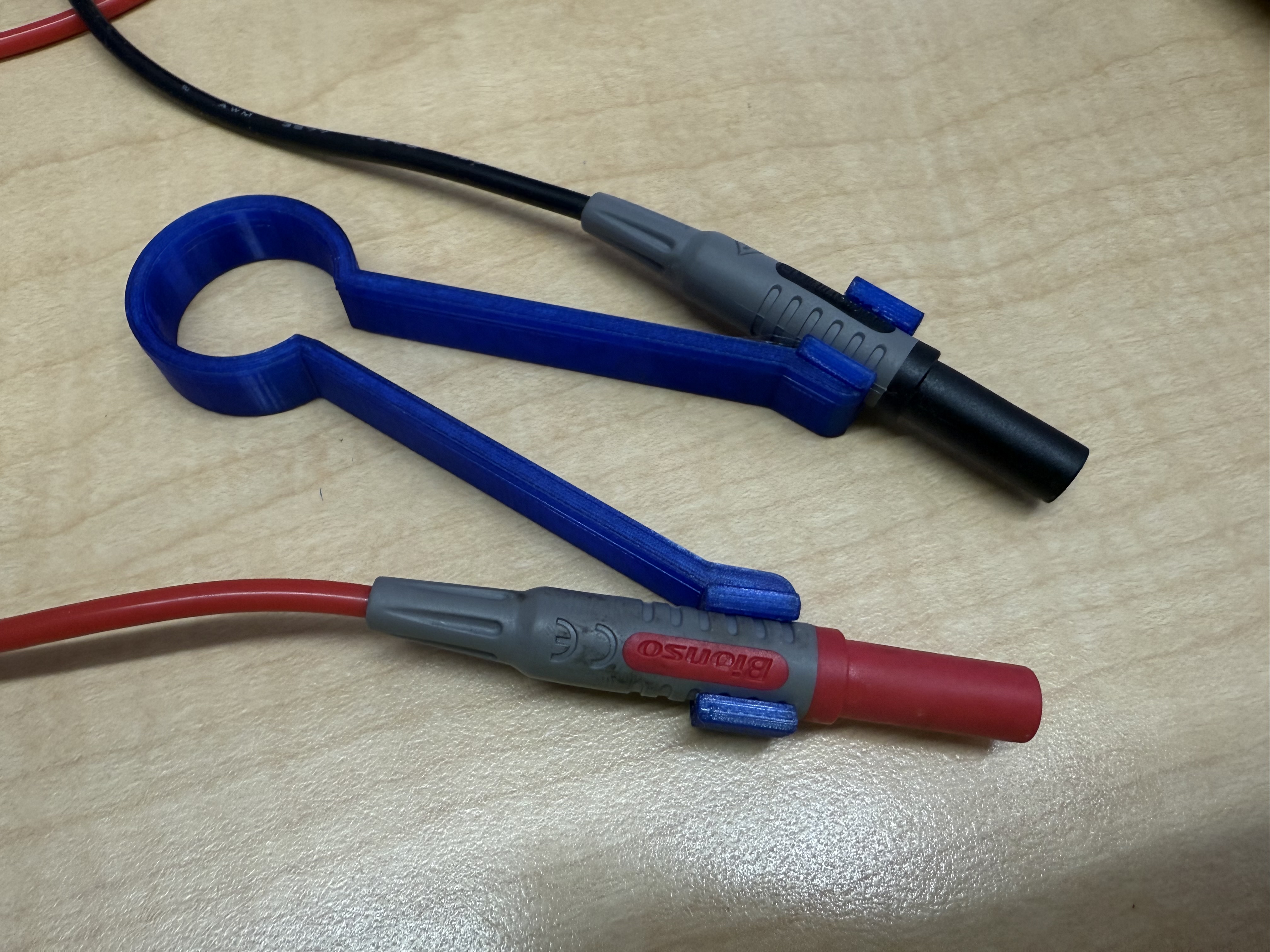 Test meter wire holder.