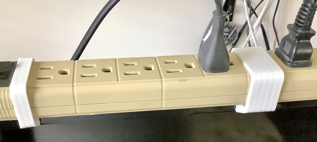Power Strip mounted over Monitor (with f3d for easy adaptation)