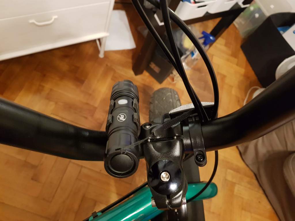 Flashlight holder for bike