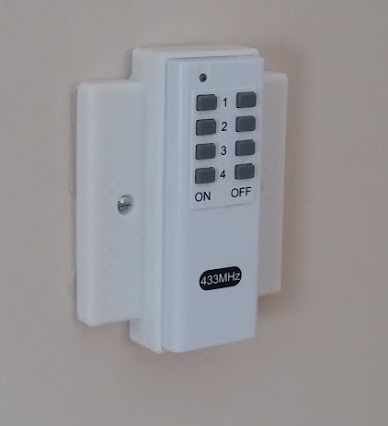 UK household light switch cover for 433MHz remote socket controller.