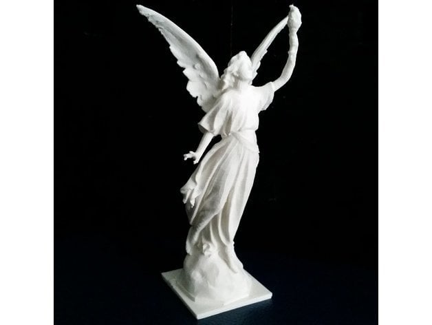 Angel statue with fire