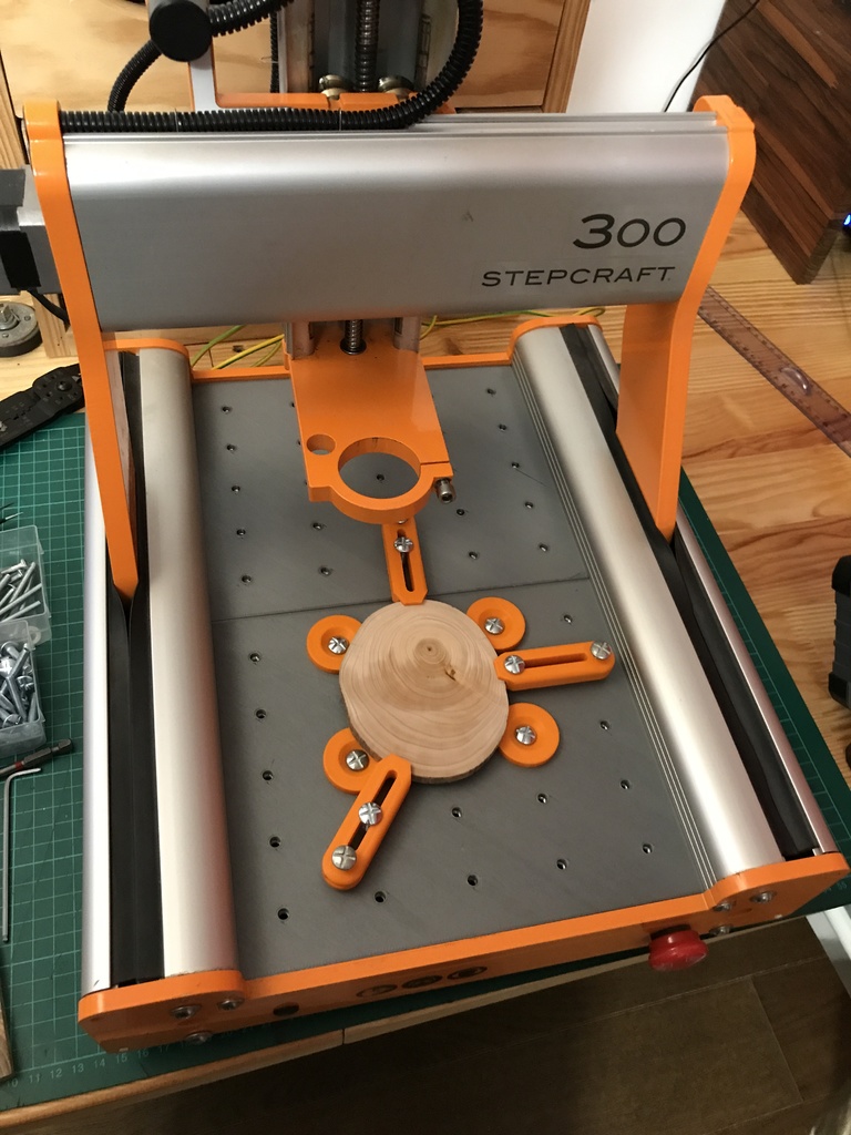 Stepcraft table clamping