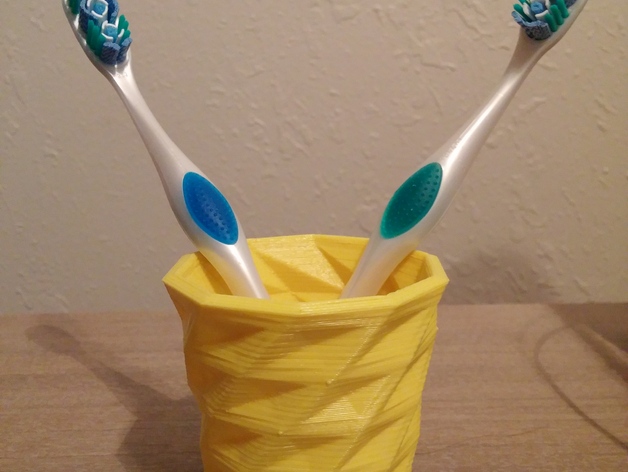 Shapeshifter Toothbrush Cup