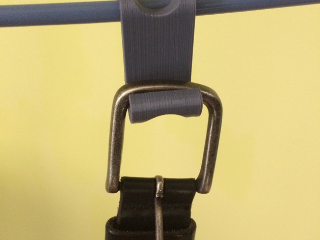 Clip-on belt holder for coat hanger