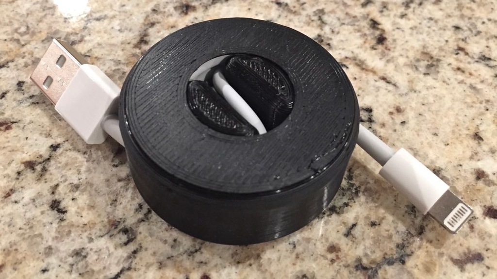 Cable Reel Organizer snug fits iPhone cord