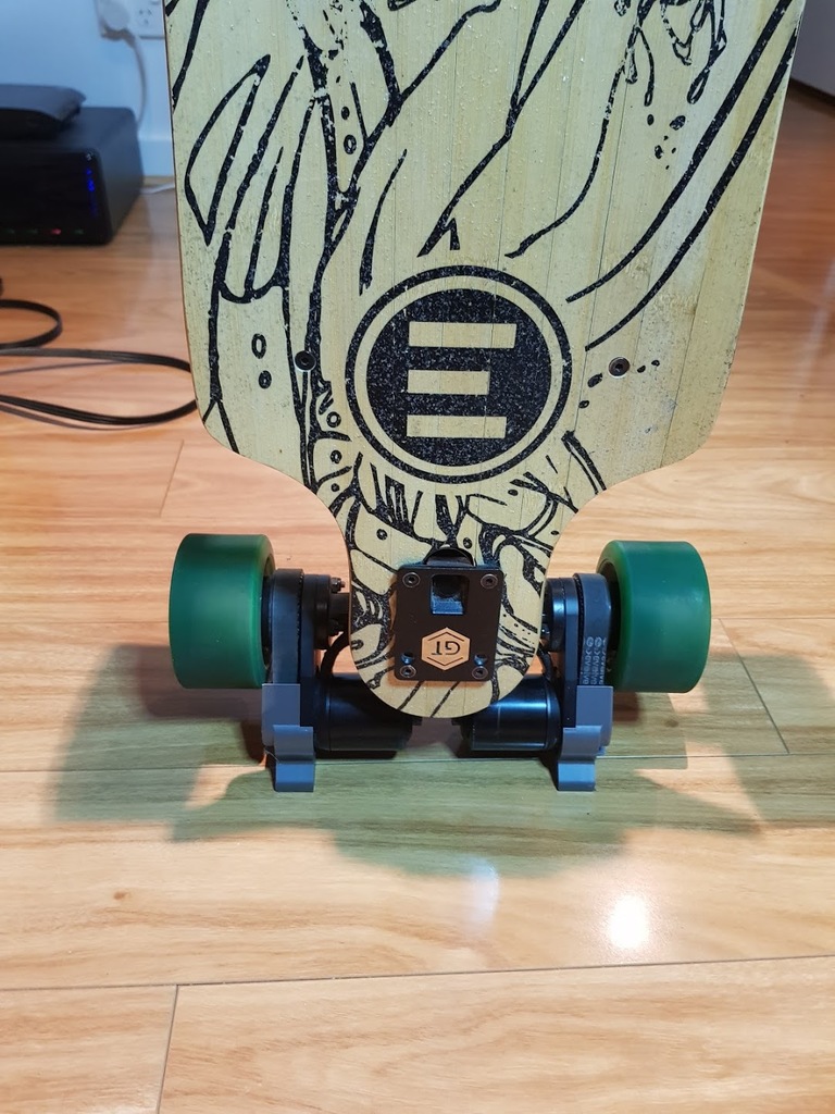 Evolve skateboard belt cover stand