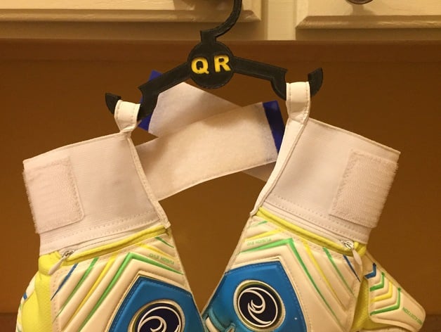Soccer goalie glove hanger