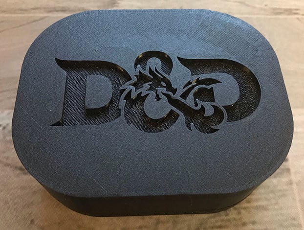 D&D 9 dice box with figurine