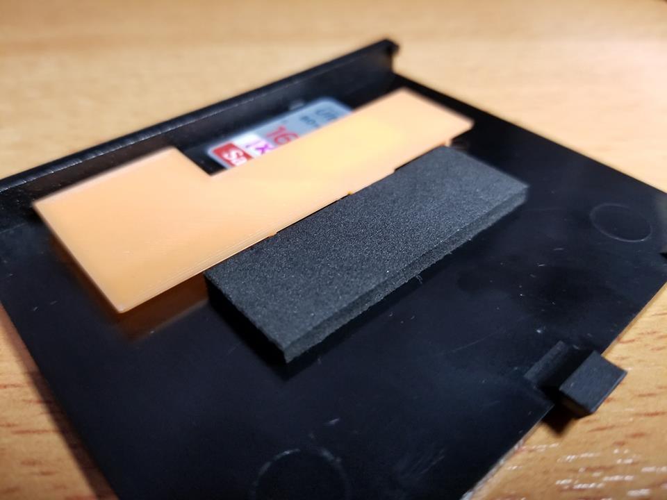 sd card holder under battery cover for ix12 