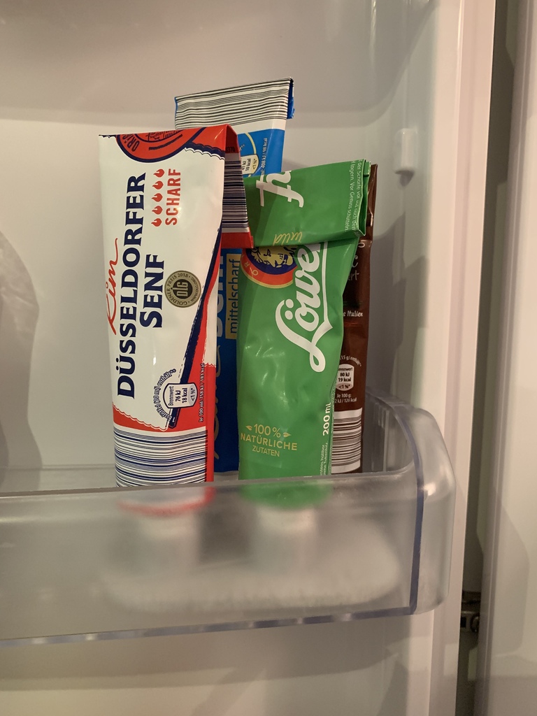 Paste tube rack for fridge door