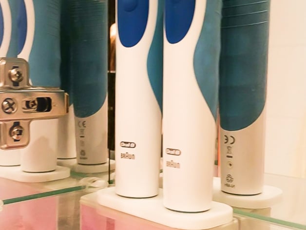 Electric toothbrush holder. Oral-B