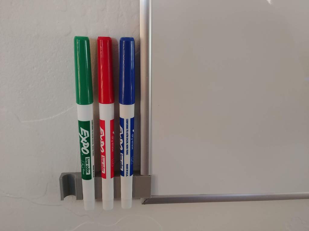 Clip-on whiteboard pen holder