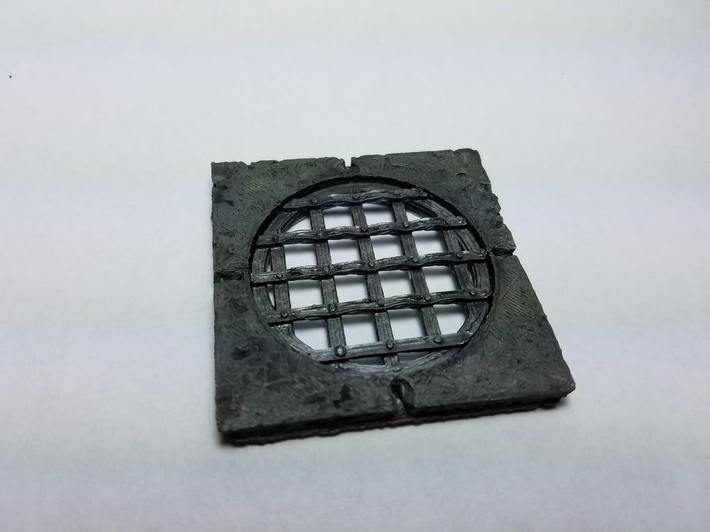Circular Sewer Grate and Stone Tile