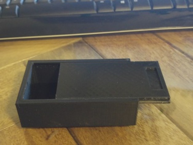 Magnetic key hiding box with sliding lid