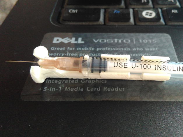 Insulin syringe holder