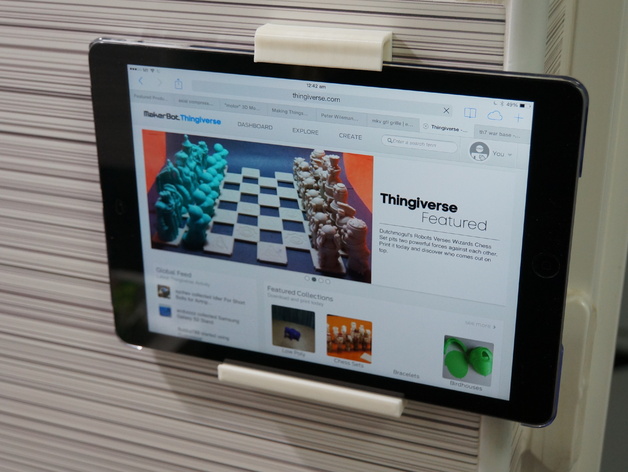Ipad/tablet wall mounted shelf and top clip