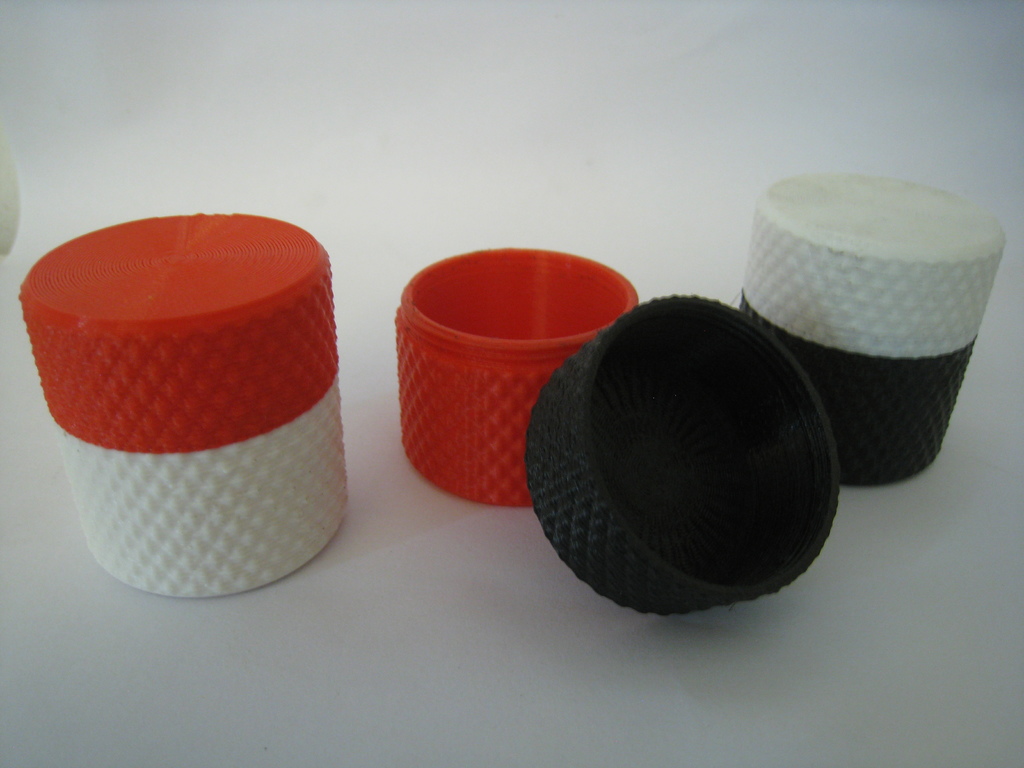 Knurled container with screw on lid
