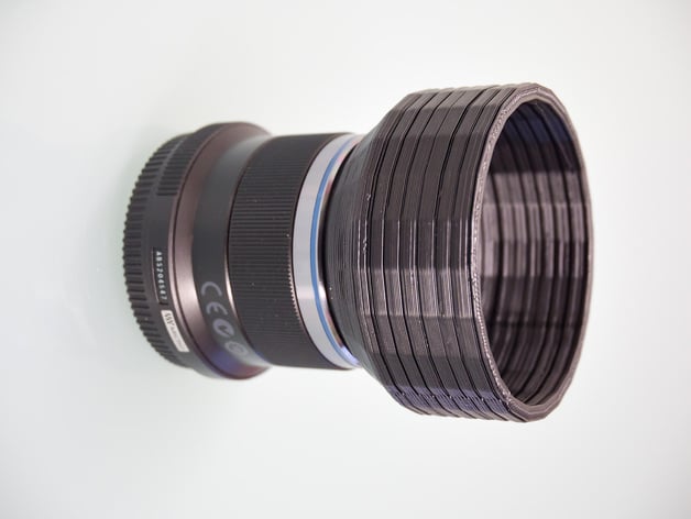 Reversible lens hood for Olympus 45mm f/1.8 lens.