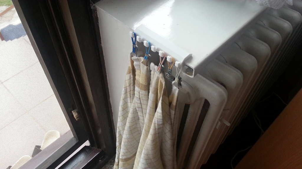 Hooks for dish towels on window ledge