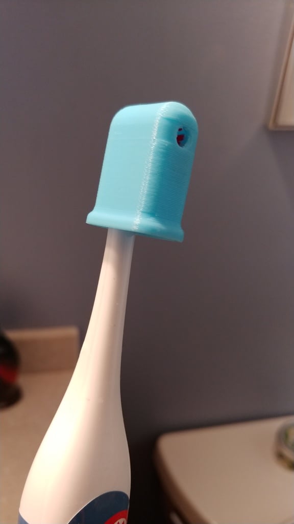 Spinbrush head cover, scale for any toothbrush.