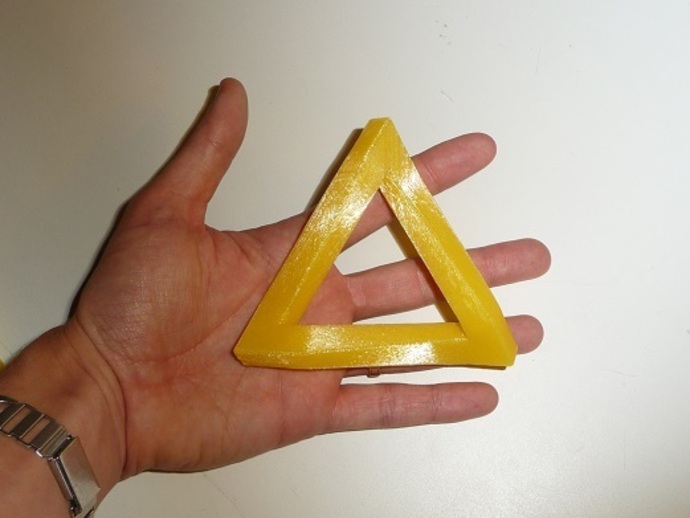 Symmetric Penrose triangle