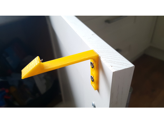 Child proofing cupboard catch