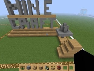 minecraft title with small landscape