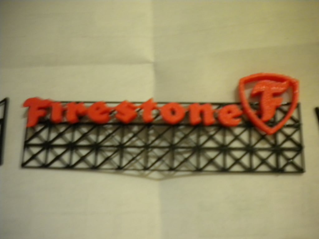 Firestone Logo Sign and Rack