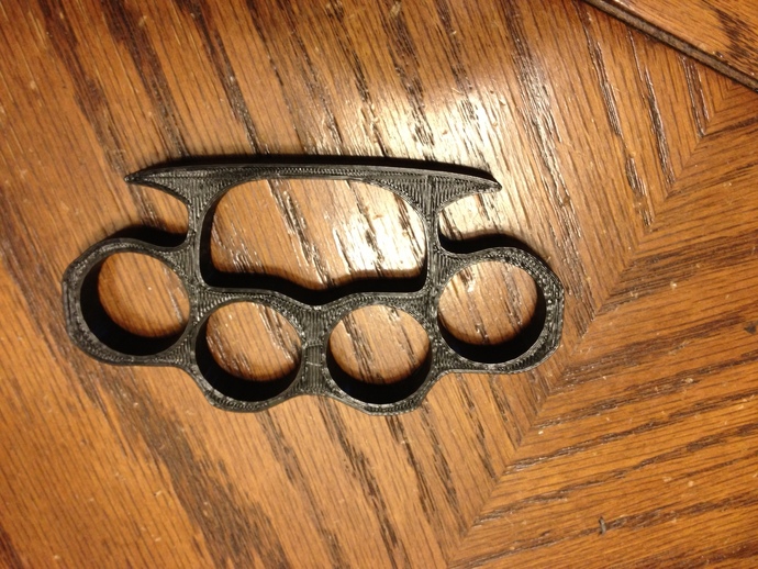 Knuckle duster "brass knuckle"