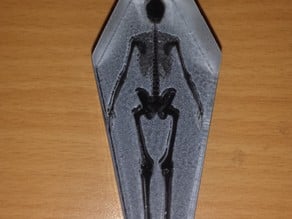 skeleton in coffin