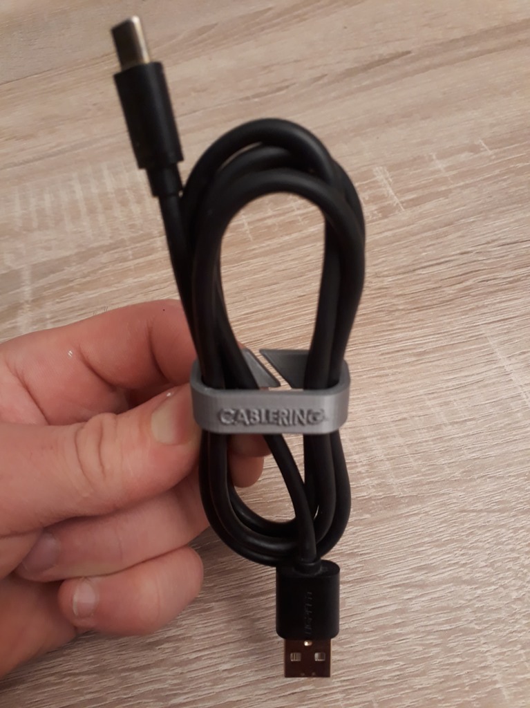 USB cable retainer - CABLERING