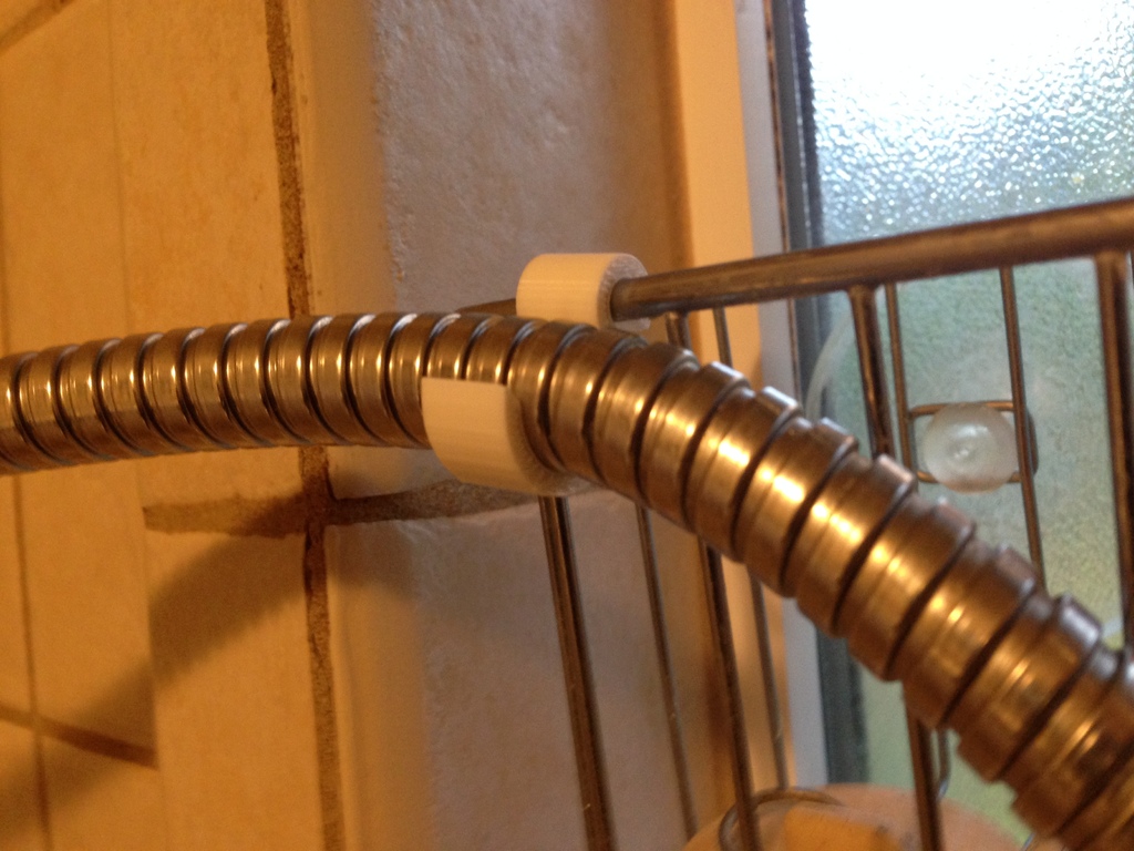 Shower hose clip