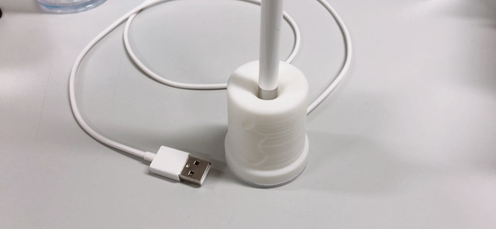 Apple pencil charging dock with apple logo