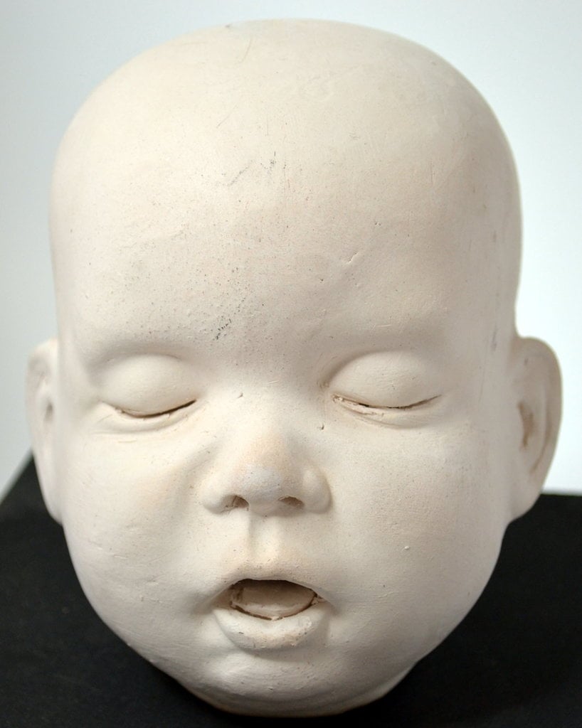 Life size baby doll head