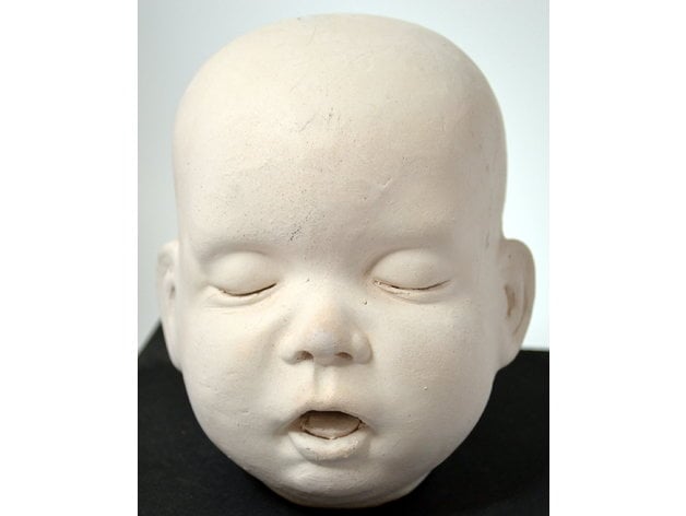 Baby head doll online