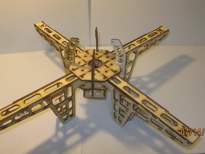 Lasered quadcopter.  24" wide, 3mm plywood.