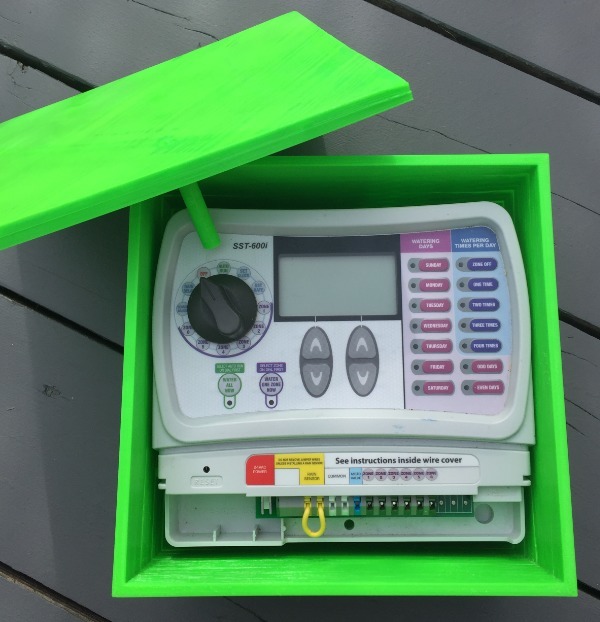 Outdoor Rain Bird SST-600i sprinkler controller box