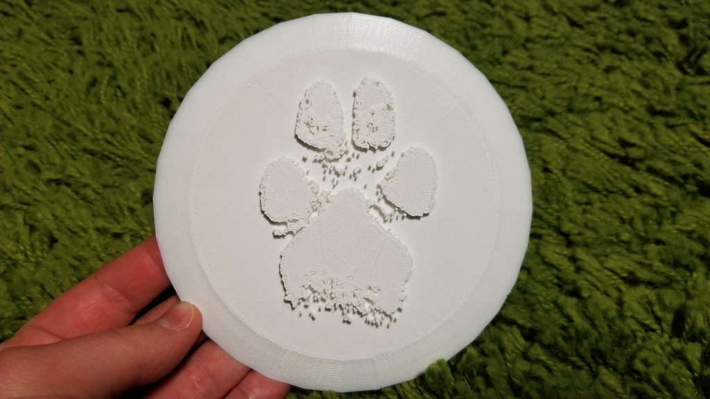 Extruded paw print