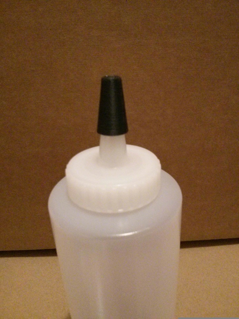 Customizable squeeze bottle lid.