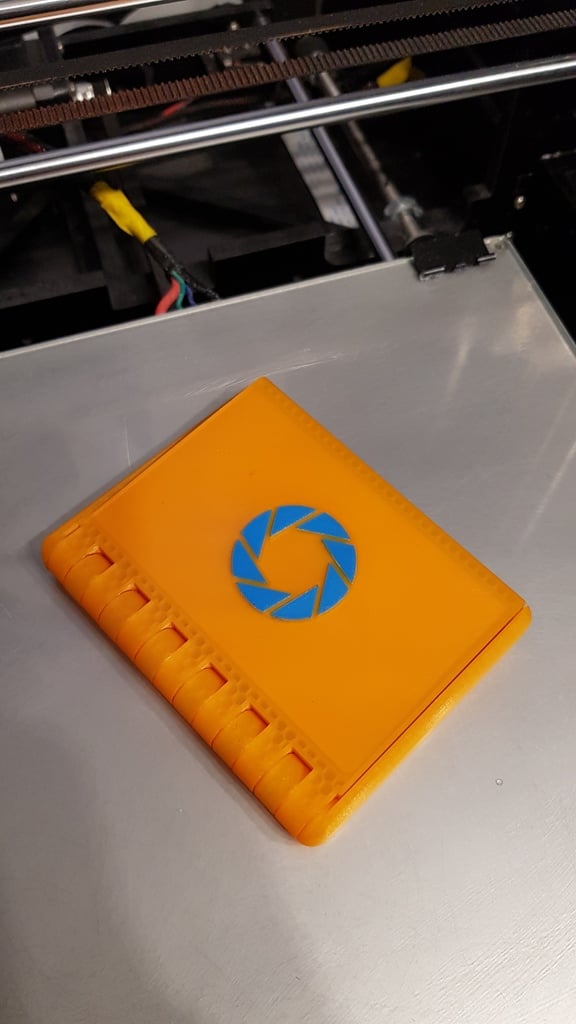 Folding wallet cassette with "Aperture laboratories" logo from Portal